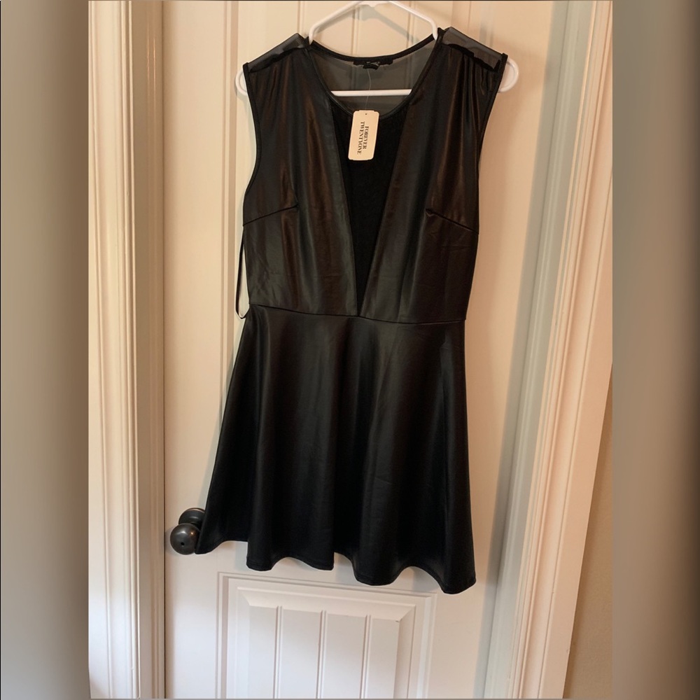 Black leather baby doll style dress